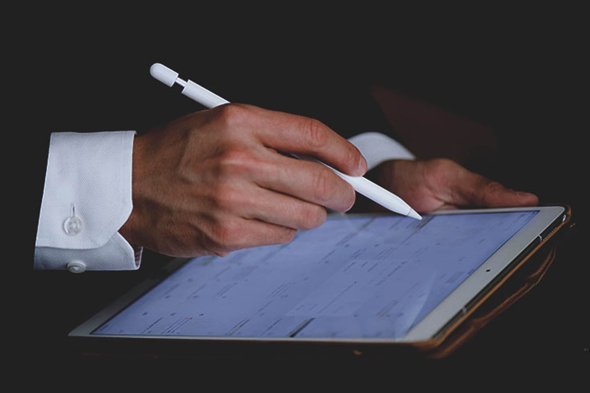 Man signing a business contract
